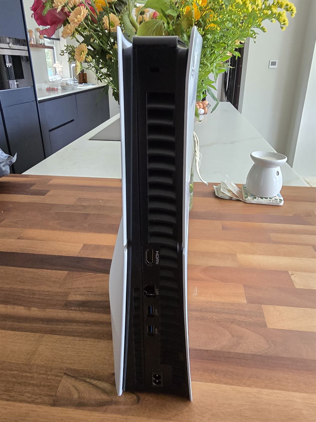 PlayStation 5 Slim Disc Edition, side view showing ports