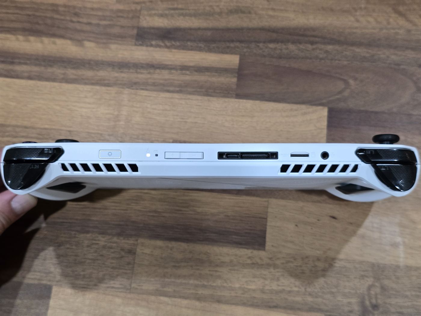 ASUS ROG Ally handheld, side view showing ports