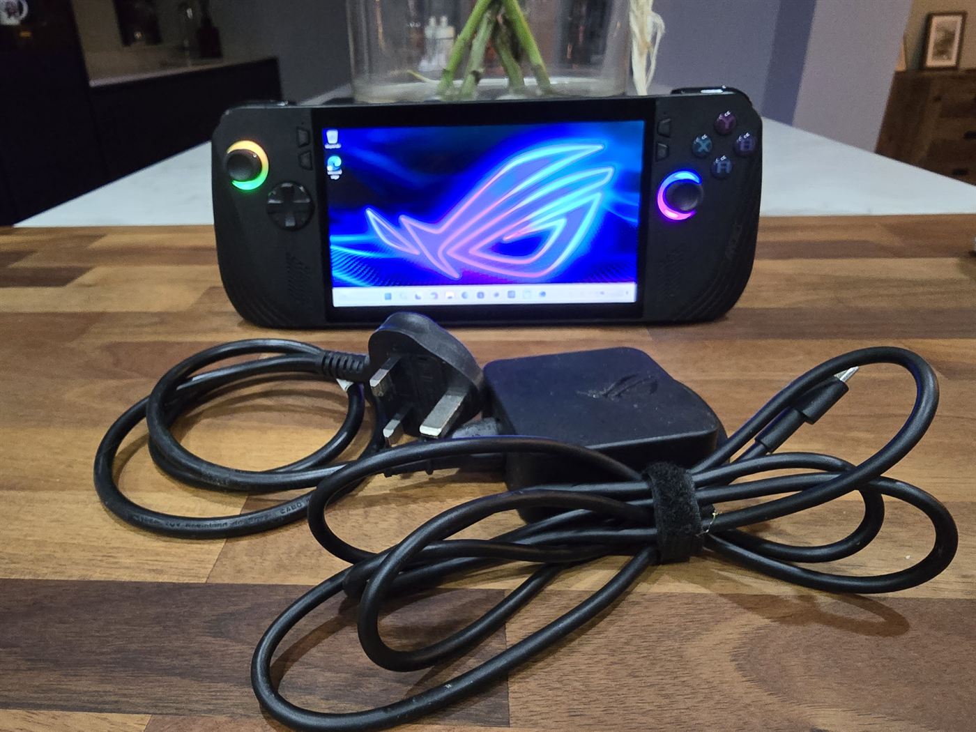 ASUS ROG Ally X handheld, front view with ROG logo on screen